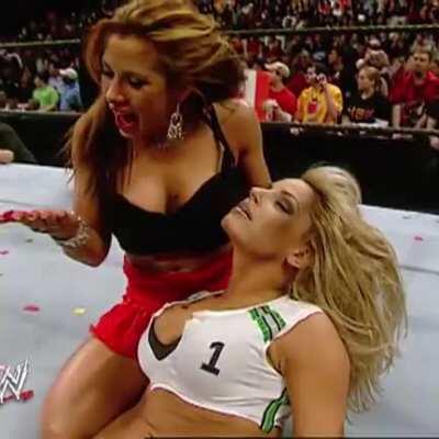 Mickie kisses an unconscious Trish
