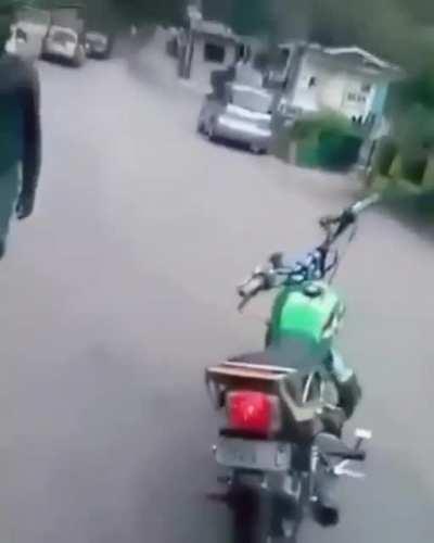 Dismounting a motorcycle (sound recommended)