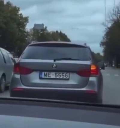 BMW driver uses blinker for the first time.