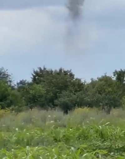 Two Ukrainian Mil Mi-8 helicopters firing at Russian positions