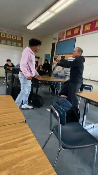 The white kid pants the kid in the pink 