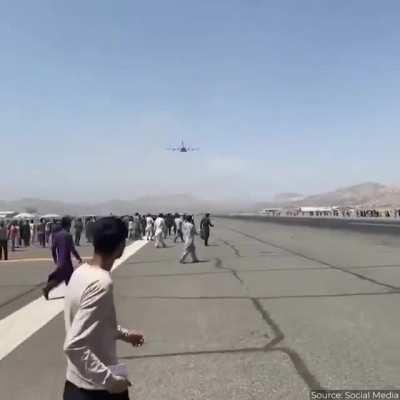 Afghans falling from plane after clinging to the plane! What the actual fck.
