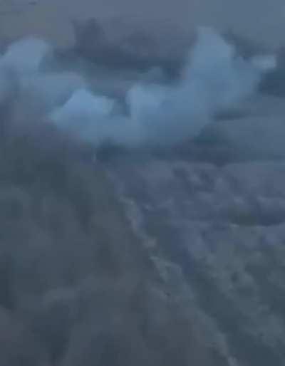 Russian soldiers on the retreat are being decimated by the Ukrainian artillery brigade. The downward pressure was just quietly released by the lonely Russian soldier who miraculously survived, as observed by a Ukrainian scout drone.