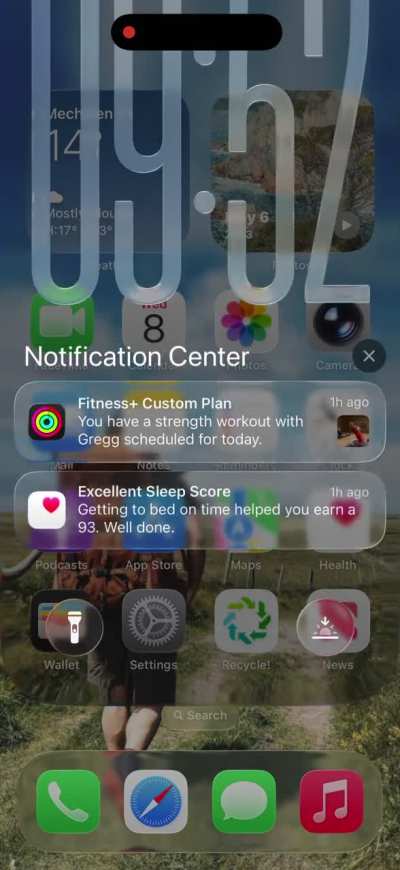 [iOS 26.1 PB 2] The lockscreen refraction seems to behave differently when hovering over the dock/bottom of the screen
