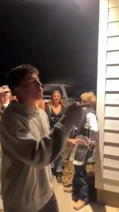 Blowing a fire with vodka