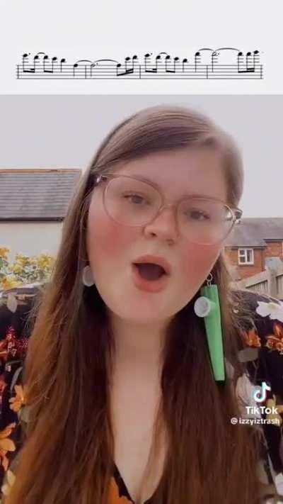 opera singer sings wii sports theme with perfect pitch (how does one sing that high???)