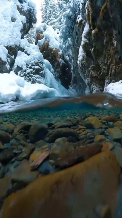 Snow Falling On A Glacial Melt, Alaska.