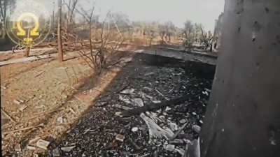 Ukrainian soldiers are storming a school building where Russian soldiers are holed up. Intense fire from small arms is being conducted. During the assault, the enemy starts firing from a 120-mm mortar.