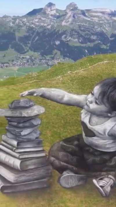 Artist Guillaume Legros paints on grass and mostly on hill & mountain sides: he has to wait for sunny days, but when this happens, slopes become immense artworks. And his paint is safe for the environment. Credit: @Rainmaker1973 Twitter