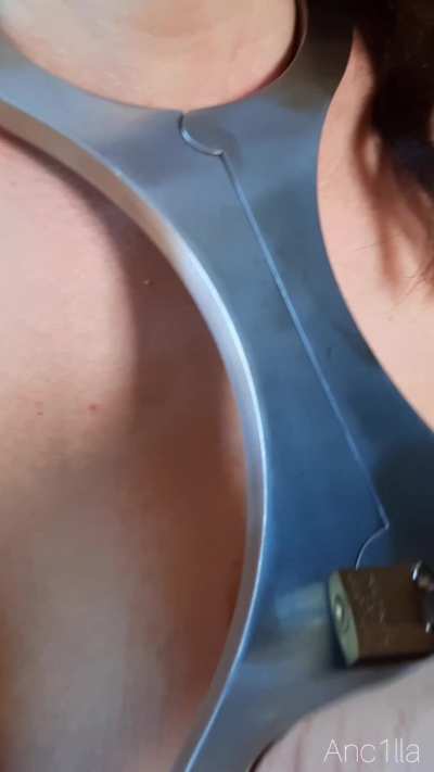 So much metal on me: chains, a chastity belt, anke cuffs and a shrew fiddle on my neck. I tried to reach the key of my chastity belt, but it was so hard with all the restraints. My friend also started to edge me while I am struggling with the weight of so