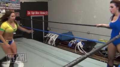 Shanna crotch kicks Taeler Hendrix in the corner