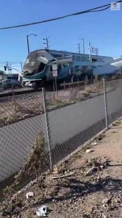 alternate angle: the moment a train slammed into a small plane that crashed onto tracks in Los Angeles