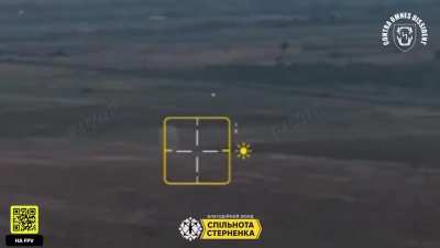 Russian soldier busy  on his phone didn't notice  Ukrainian  drone approaching him