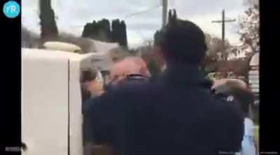 Australian police smash an old man's head into the side of a car for not enforcing mask rule in a store