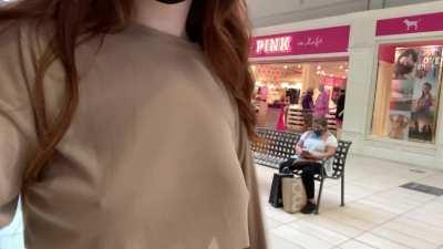 Beauty flashes titties in a mall