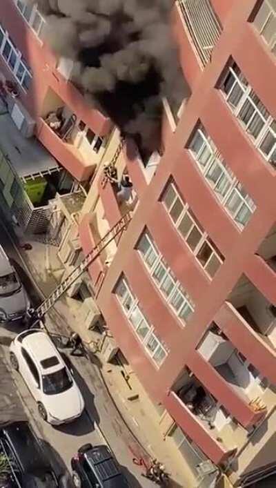 Person falls from a ladder trying to escape the fire