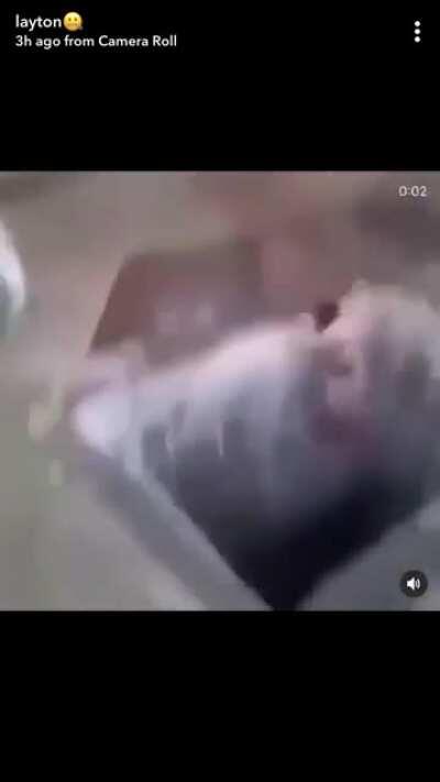 Man tries to jump over a big hole and falls