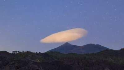 This cloud stays in the same place over a mountain for the whole day