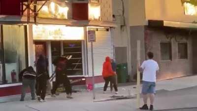 [May 2020] Young woman pleads for peace with group of George Floyd rioters who want to rob a nearby jewelry shop. The rioters immediately beat her and her husband savagely with 2x4's