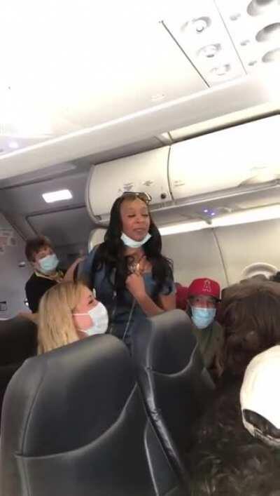 Karen tells entire plane she can't move out of the way because of privilege.