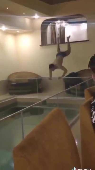 Trying to dive from a glass balcony