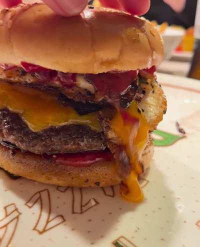 Homemade Burger with caramelized onions and egg