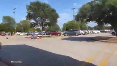 Live streamer and friend run through isles knocking items off of shelves in grocery store