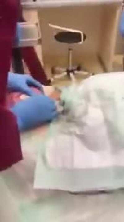 Using an angle-grinder and bolt-cutters to remove a solid steel cock-ring