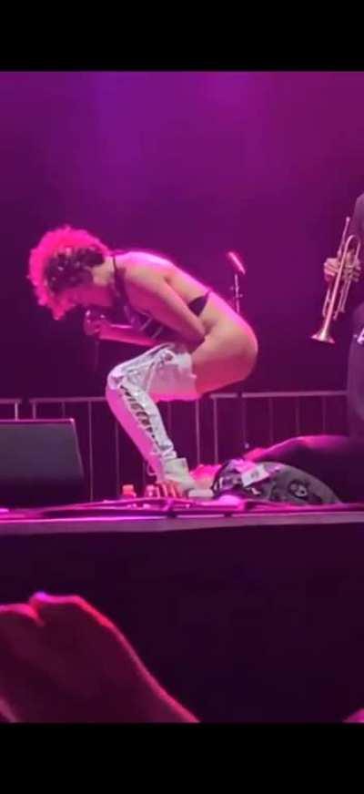 Brass against singer Sophia Urista showers on fan