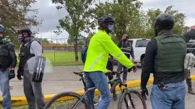 Proud Boys illegally harassing people.