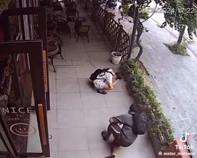 Dude regrets not paying attention. jumped right into a glass wall.