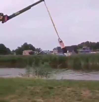 Causally swinging from a crane