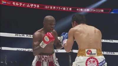 Mthalane makes Yaegashi wince in pain from a body shot