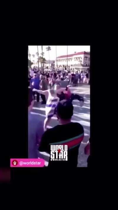 Racist lady gets beat up for saying the N word