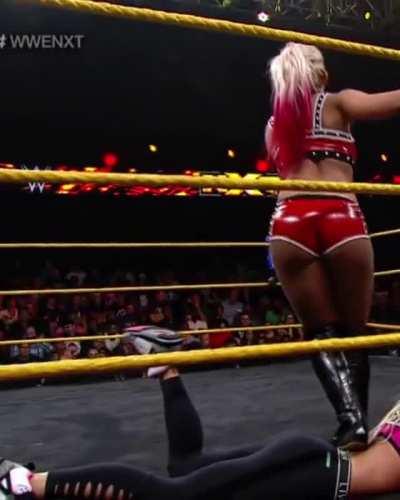 Alexa Bliss stomping her Opponents