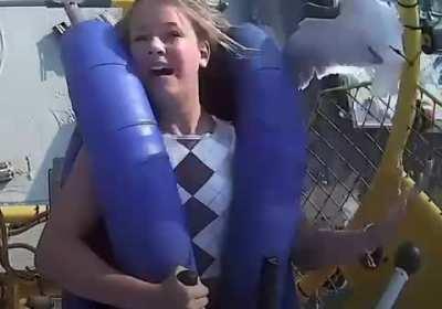 This bird crashing into a girl on the ride