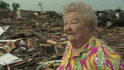 Woman tearfully reunited with dog after tornado destroys her home
