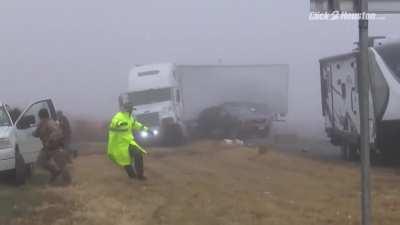 Flouro trooper runs out of the way of rolling semi