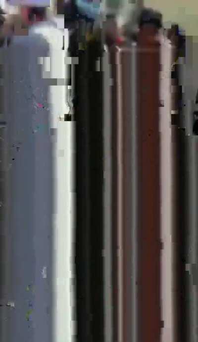 School Teacher attempts to intervene in a fight and Catches a Vicious Beatdown...