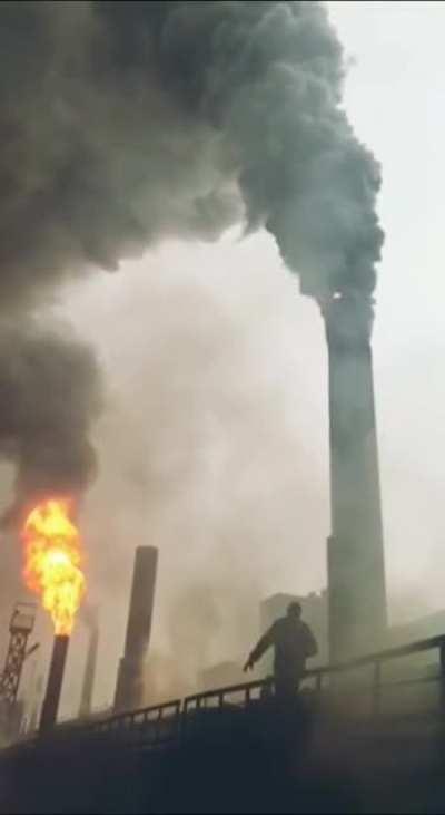 Lighting up a smoke stack with a torch
