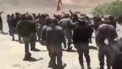 Tibetans who are part of India's secretive Special Frontier Force, celebrate with Tibetan flag after successfully taking over one of the China's strategic posts in the Ladakh area disputed between India & China.