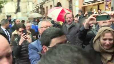 French Politician (Eric Zemmour) gets an egg on his head.