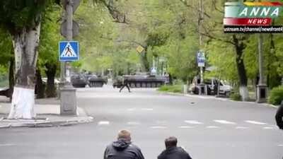 Civilian spectators watching a battle between Ukrainian Army and Pro-Russian rebels in Donetsk, Ukraine.