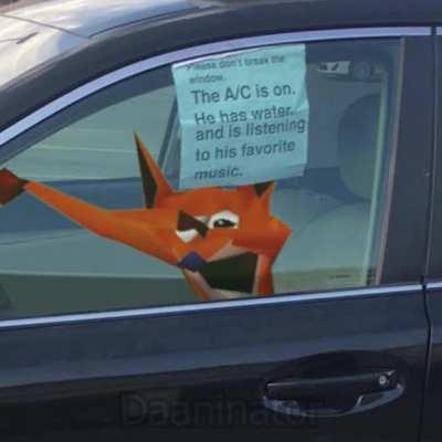 The AC is on and he is listening to his favorite music