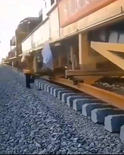 21st century railway construction - uncredited, no other information available, but awesome.