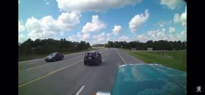 Cutting in front of a semi truck to make a turn.