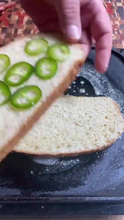 Hot dog grilled cheese with jalapeños and onions in the sourdough!  