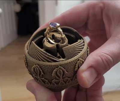 Here's an Iris motifed, mechanical iris engagement ring box I made for my Fiance Iris. Printed as one piece on a Fuse 1+ SLS from Nylon 11