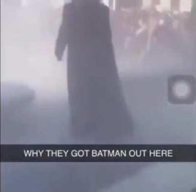 Batman arrives to assist protestors