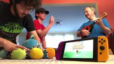 I found a squeaky octopus toy for babies. Then I taught my dad and brother the accompaniment. Hilarity ensues.